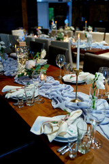 napkins on the table with a seating card restaurant wedding decor