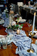 napkins on the table with a seating card restaurant wedding decor