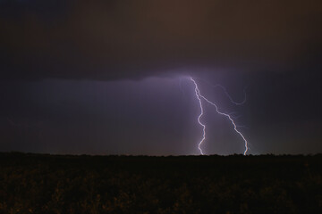 Obraz na płótnie Canvas double lightning in the night sky bright flash