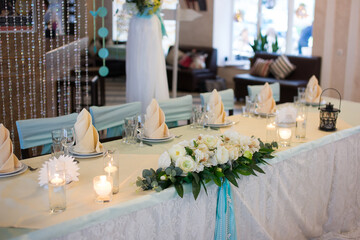 restaurant from the inside the interior is decorated with floristry candles for a holiday wedding party