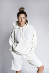 Young woman stylish woman wearing white hoodie