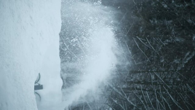 A jet of snow from a snowplow