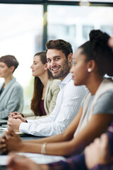 Obraz premium Were all about keeping to high standards of excellence. Portrait of a businessman sitting with his colleagues in a boardroom meeting.