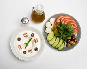 Lebanese food of Labneh Yogurt cheese with Olives and veggies
