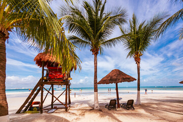 Cancun Mexico beautiful caribbean sea on a sunny day and cloudy sky. Sandy beach