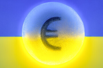 euro sign in an ice circle on the background of the Ukrainian flag