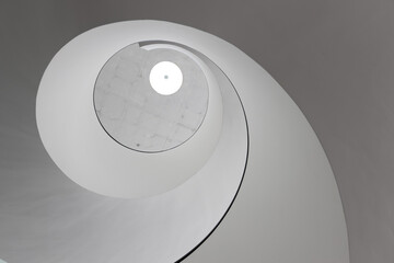 Сircular staircase. Part of a modern minimalist staircase in circular form in white background