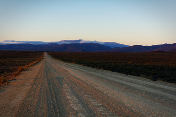 Fototapeta na wymiar Sunrise gravel road in Tankwa Karoo National Park