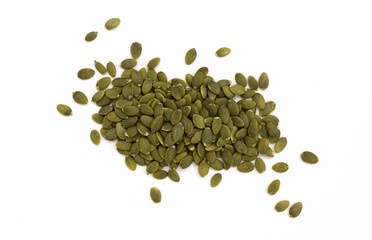 heap of green pumpkin seeds, close up