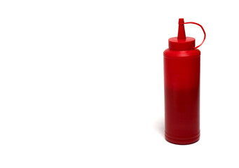 red plastic bottle spout ketchup white background