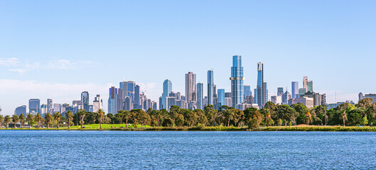 Fototapeta premium Melbourne cityscape with skyscrapers, blue sky and Yarra River.
