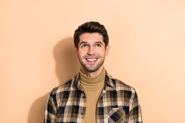Portrait of smart guy agent look up empty space dreaming shopping sale isolated pastel color background