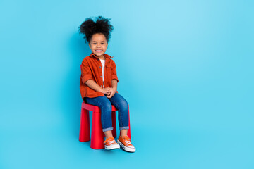 Full body photo of cute adorable sweet little girl sitting chair spend time in kindergarden...