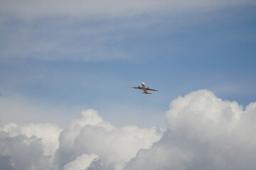 Plane is flying over clouds