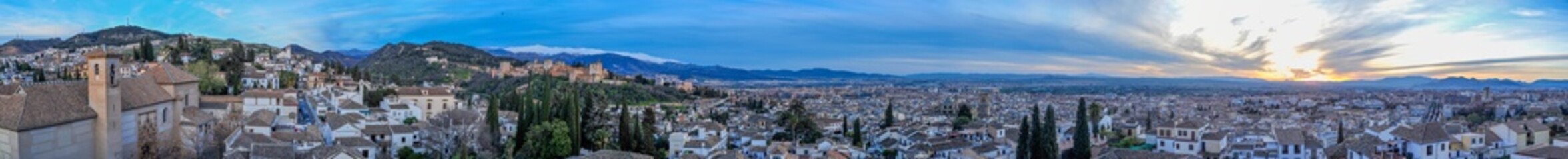 Fototapeta na wymiar panoramic landscape photography of the alhambra in granada with sierra nevada in the background views of the candle tower