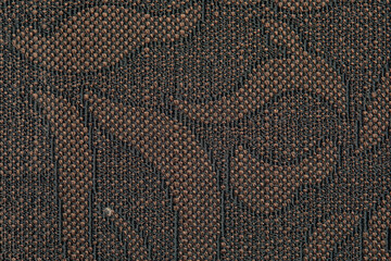 Floral old retro vintage ornament fabric in brown color on background. Cute ornament floral pattern. Background wall design. Vintage wallpaper