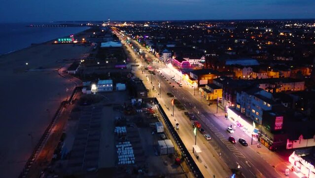 Night Aerial Shot  with weekend crowded North direction. Flying over the city at night in the spring