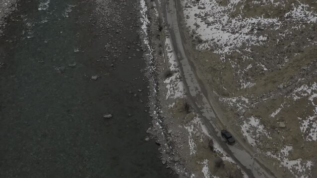 Very scenic View of turquoise Colour of attabad lake with mountains and KKH Road at Hunza Gilgit Baltistan.
