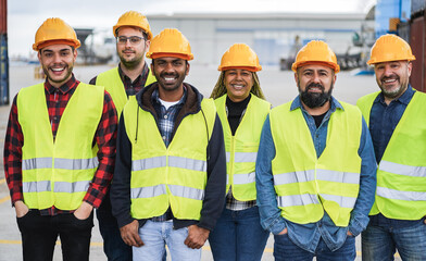 Multiracial people working together at industrial port outdoor - Focus on african senior woman face