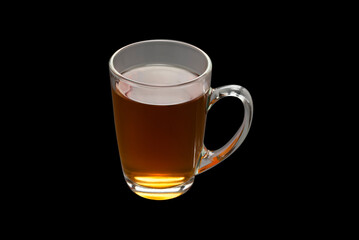 A turkish glass of tea on black background.