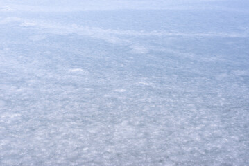 Natural texture of ice, frozen lake  as  background.