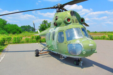 Mi-2 Hoplite. Helicopter standing on the site on a sunny summer day
