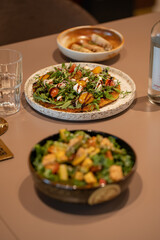 Gourmet food on wooden table served with friends