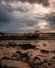 Boats at the beach during low tides