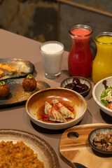 Iftar food menu with juice, dates, and laban