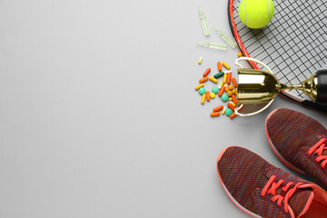 Flat lay composition with drugs on light grey background, space for text. Doping control