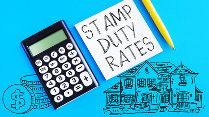 Stamp duty rates are shown on the photo using the text - obrazy, fototapety, plakaty