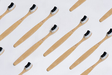 Set natural wooden bamboo toothbrushs on white background dental care zero waste recycled life style