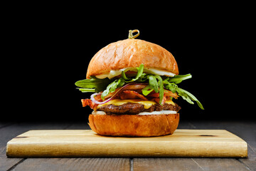 Tasty beef burger with bacon - obrazy, fototapety, plakaty