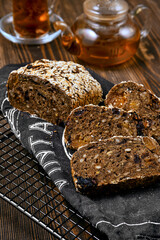 Close up view of artisan rye bread with dried apricots, prunes and seeds