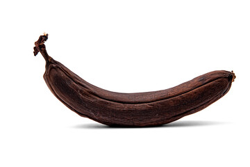 Overripe banana in the peel, isolated on a white background