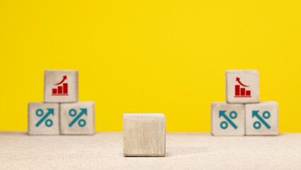 Concept of financial and mortgage interest rate. Concrete cubes with percent sign. With copy space.