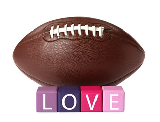 American football ball and cubes with word Love on white background