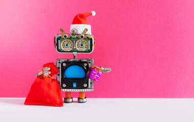 Merry Christmas happy New Year robotic greeting card, invitation template. Santa Claus robot with a bag of gifts on pink gray background. Copy space.