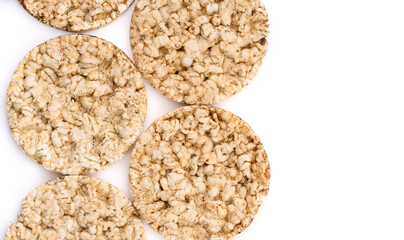 Puffed rice bread isolated on white background. Rice cakes. Round diet crispbreads on a white background. Round shaped cereal bread, healthy food without yeast. 