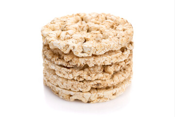 Puffed rice bread isolated on white background. Rice cakes. Round diet crispbreads on a white background. Round shaped cereal bread, healthy food without yeast. 
