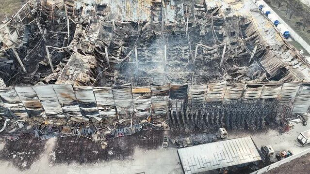Blown up burnt building. Bombing attack in Ukraine.