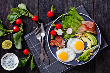 fried eggs, lettuce, avocado, radish, peanuts, ham