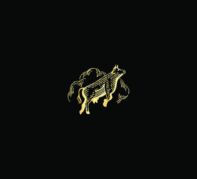 Flying cow. Beautiful logo in gold coloring