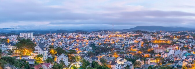 Panorama landscape photo: Da Lat city at dawn. Time: April 7, 2022. Location: DaLat city.  Da Lat is a famous tourist city in Vietnam