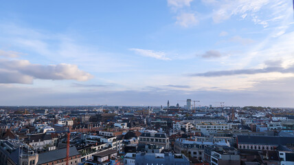 Cityscape of Gent during sunset with clouds