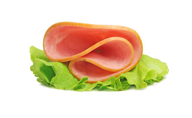 A slice of smoked ham on a leaf of salade isolated on white background