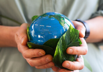 hand holding globe environment esg concept