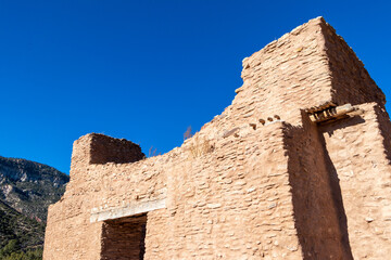 Historic southwestern mission church with blue skies