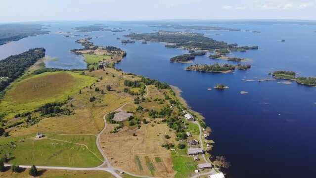 Kizhi Island and Kizhi Pogost wooden church open-air museum, aerial summer vibrant view of Onega Lake, Medvezhyegorsky District, Republic of Karelia, Russia

