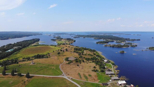 Kizhi Island and Kizhi Pogost wooden church open-air museum, aerial summer vibrant view of Onega Lake, Medvezhyegorsky District, Republic of Karelia, Russia
